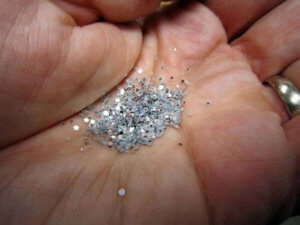 She Holds Sparkle in the Palm of Her Hand