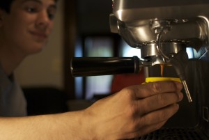 Pulling the first shot - Prepare the espresso (step 1 of how to make cappuccino at home)