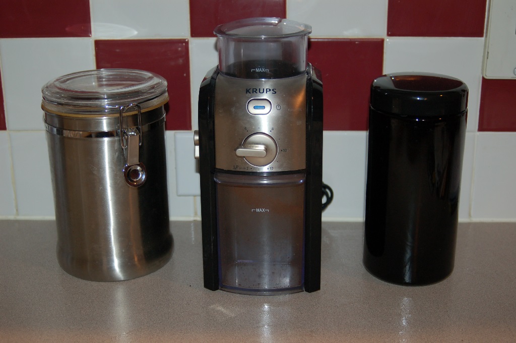 Left to right (my old coffee jar, my Krups Burr Grinder, the Infinity coffee jar)
